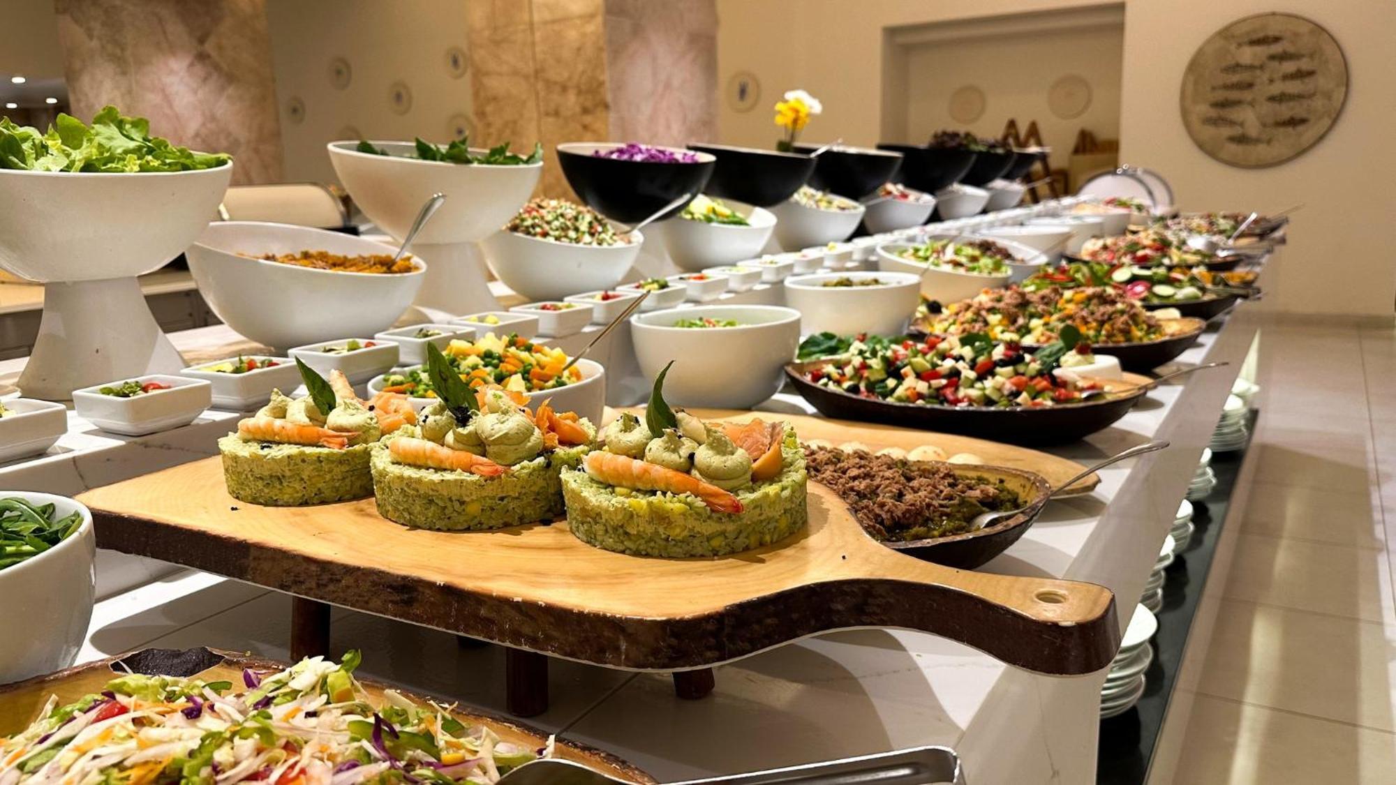 Royal Azur Thalassa Hammamet Exterior photo A selection of salads at a buffet